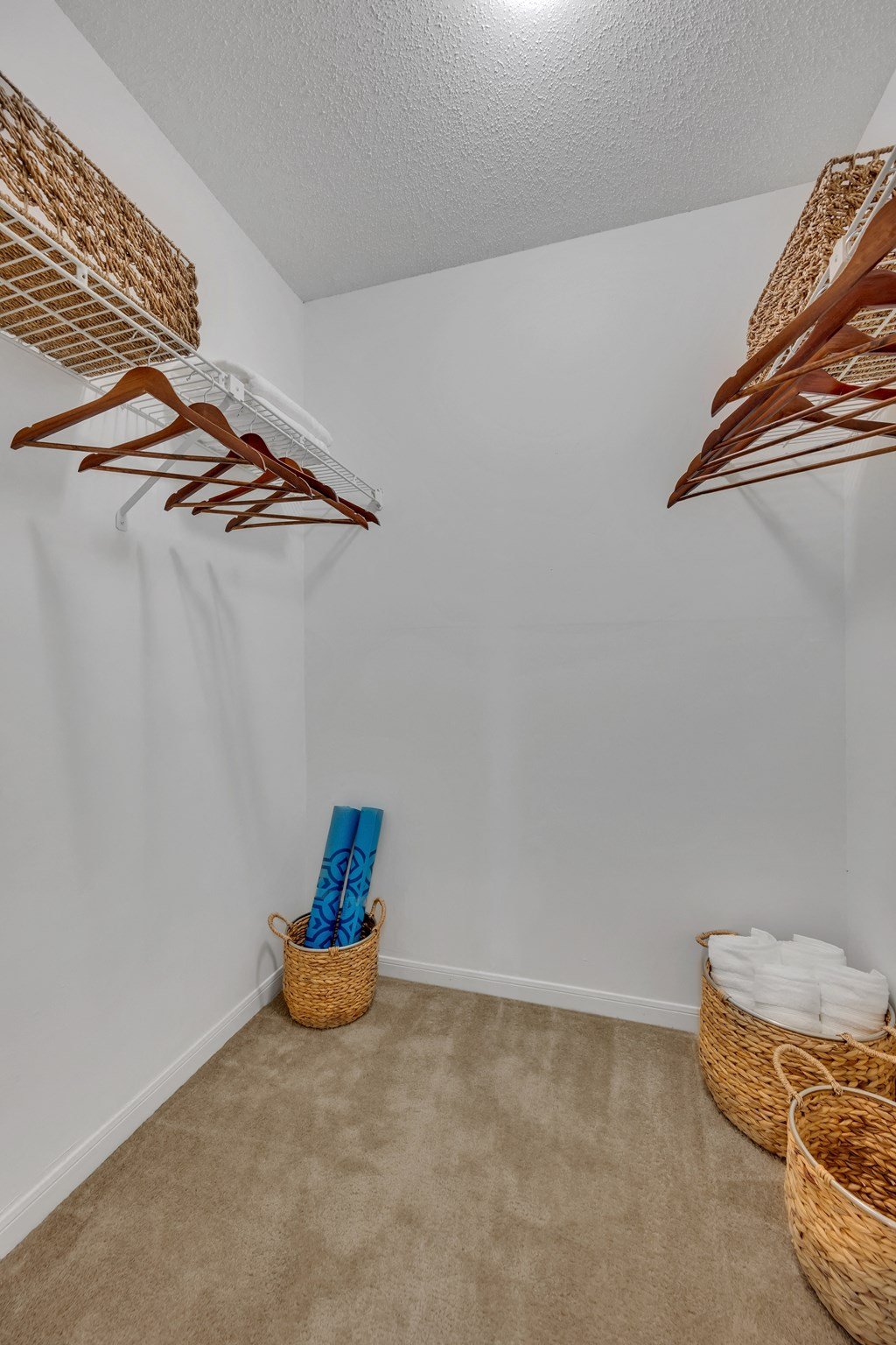 our closets are full of wicker baskets and baskets on the wall